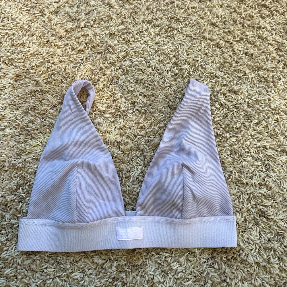 SKIMS cotton plunge bralette. Size medium. Never worn. Color is iris mica.